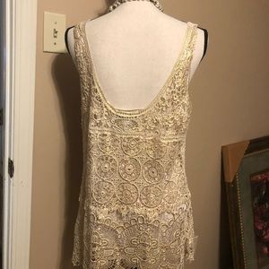 Long lace tank top with a delicate silk lining.
